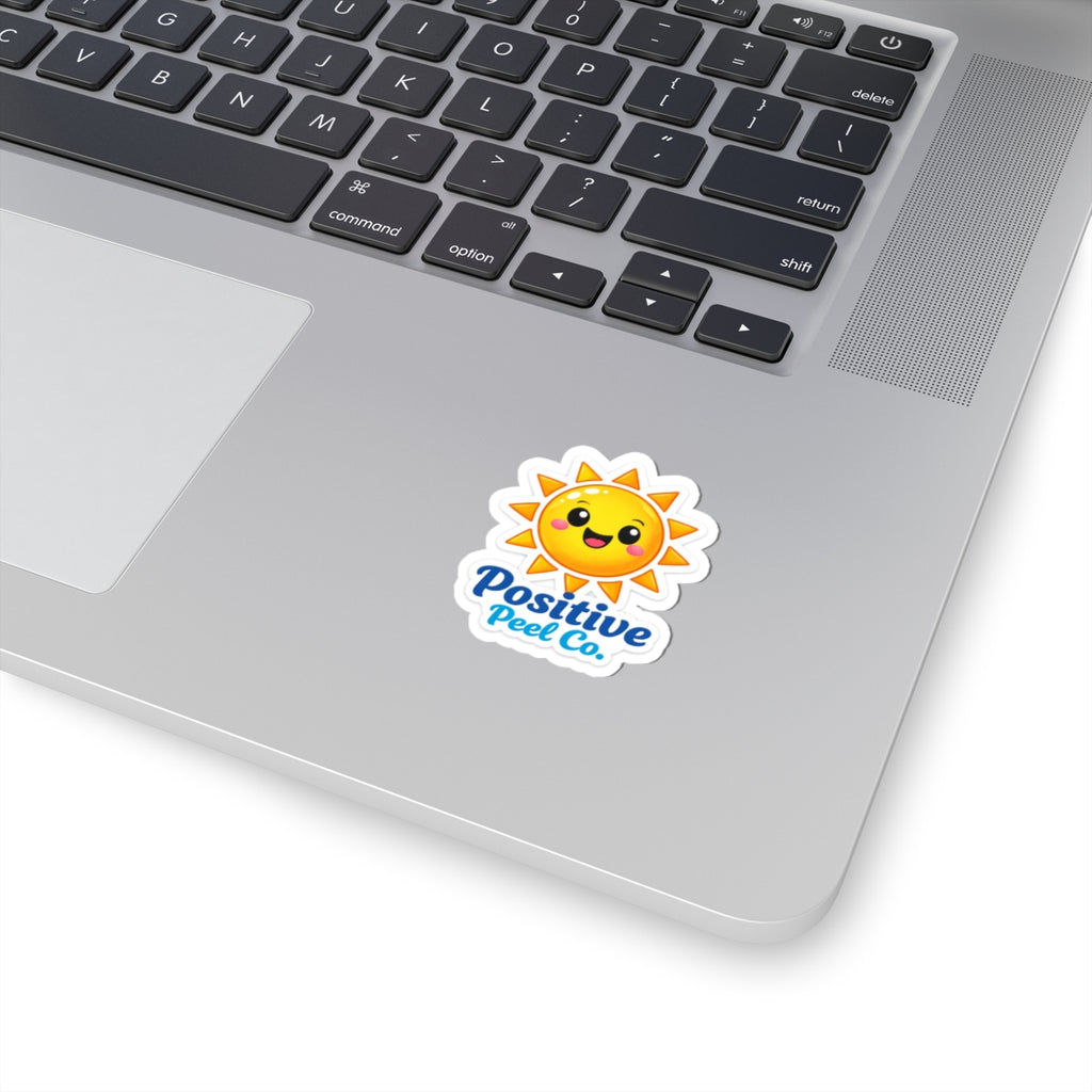 Cheerful kawaii sun sticker with happy face and Positive Peel Co. logo — cute bright gift for kids and anyone who loves sunshine and good vibes