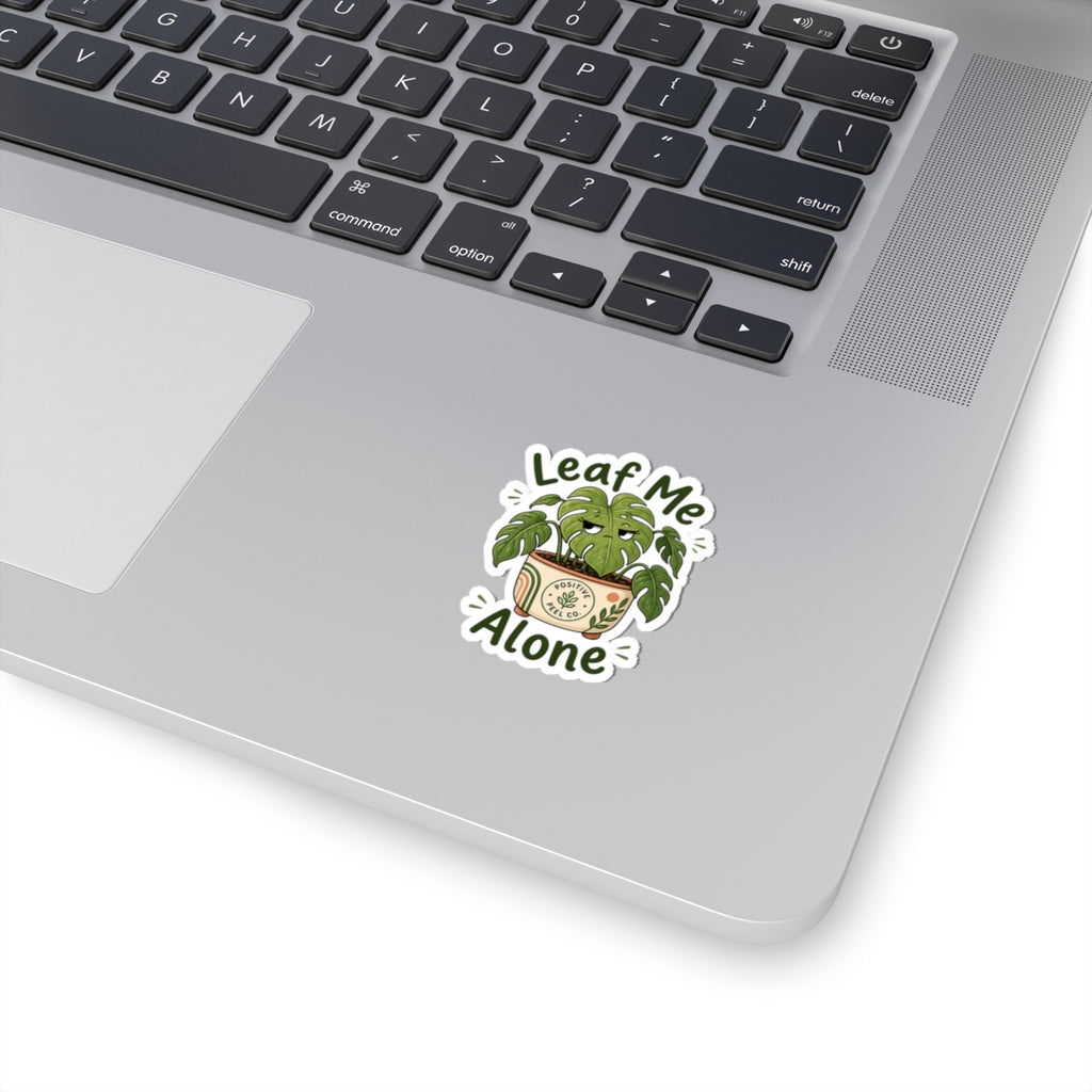 Funny plant sticker with grumpy monstera giving side eye saying leaf me alone — perfect gift for introverts and plant lovers